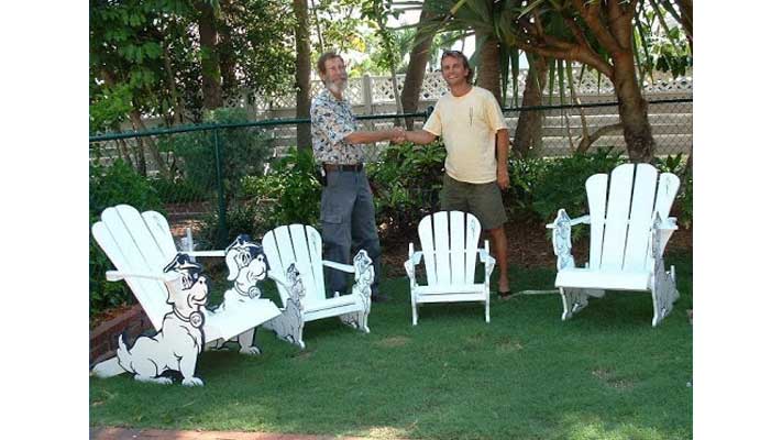 ITOF - Two people shaking hands beside with white wooden chairs